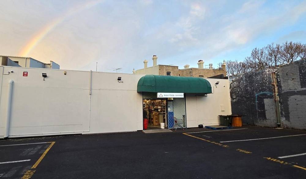 Bulk Food Savings storefront with rainbow