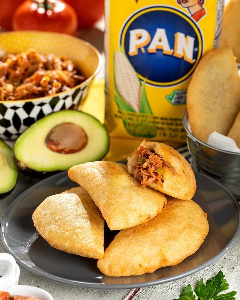 Corn empanadas with shredded beef filling, avocado and PAN flour