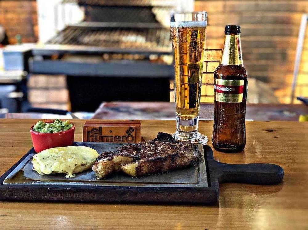 El Humero steak with cheese and Club Colombia beer