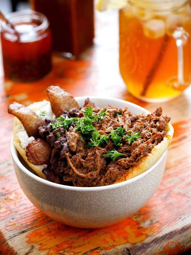 Olas Arepas shredded beef arepa bowl