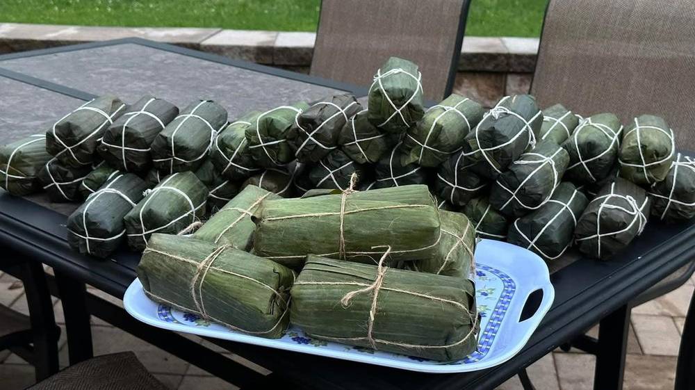Tray of tied tamales